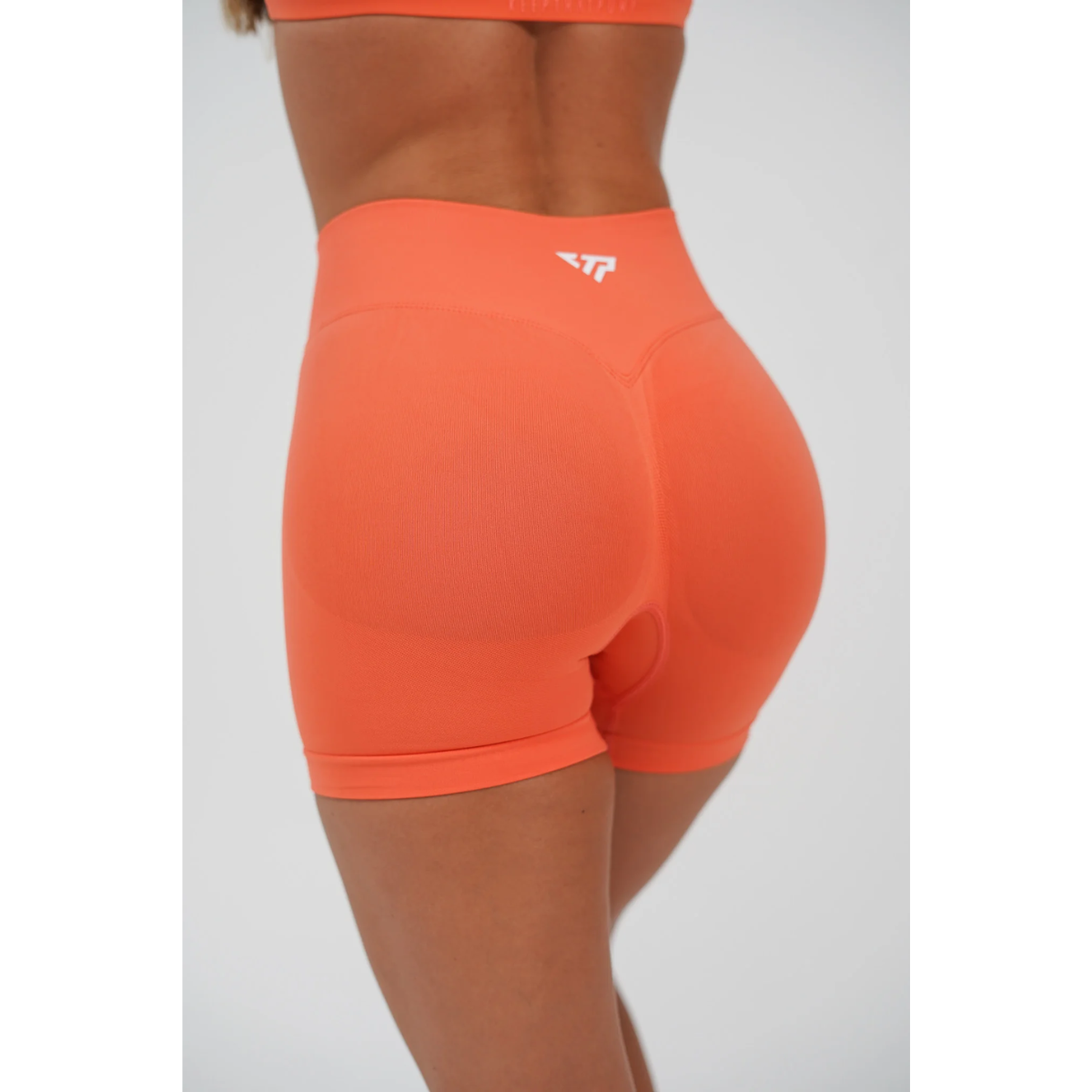 KEEPTHATPUMP Recoil Scrunch Shorts (Tahiti Orange)